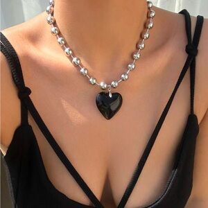 Brand New: Silver and black heart necklace choker style - Still in packaging
